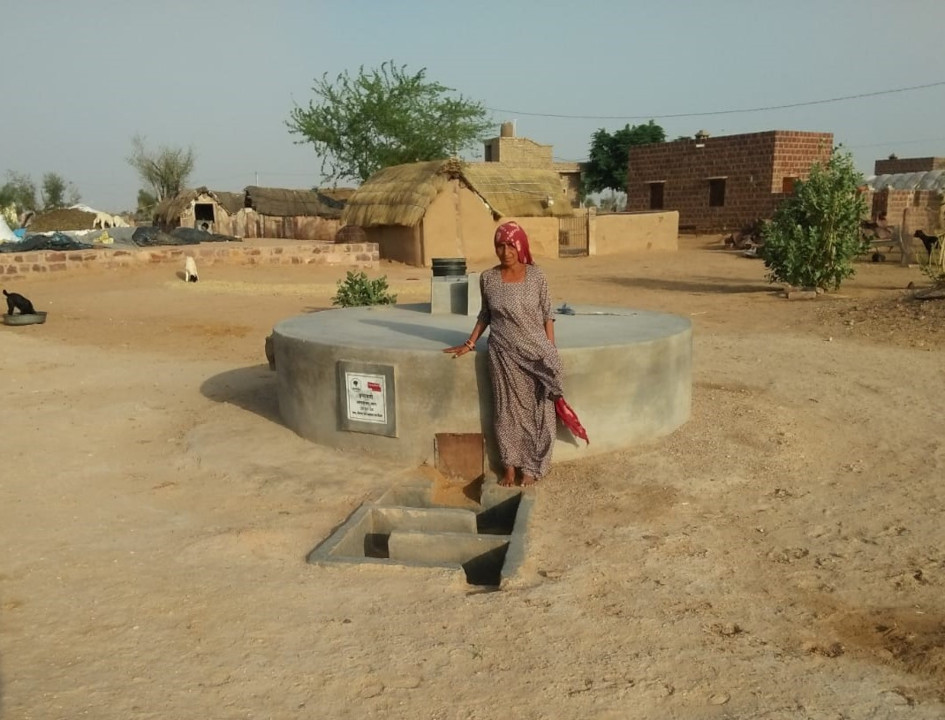 Inyato Khatun fetching water from her Taanka